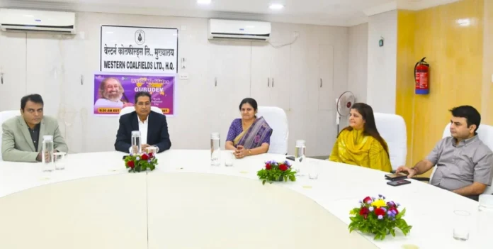 Employees and officers engaged in meditation on World Meditation Day at Western Coalfields Limited